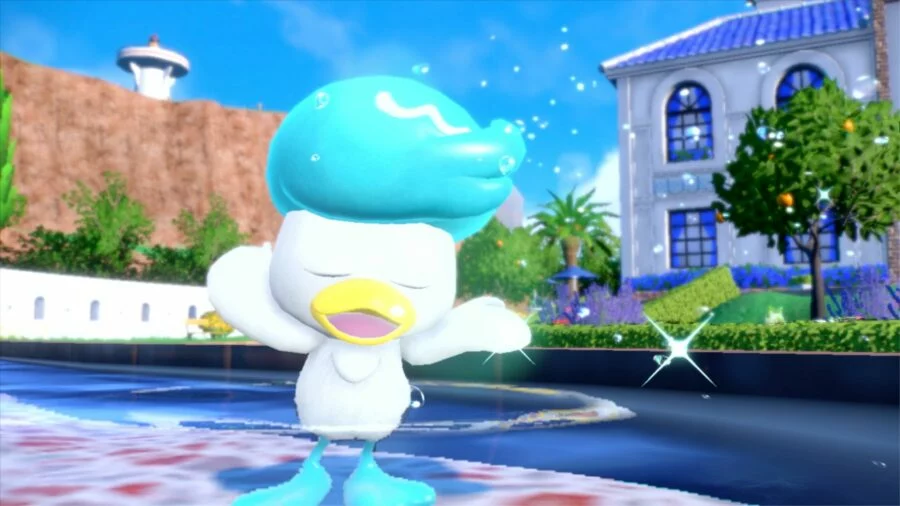The Pokémon Quaxly. It is a white duck with a large blue quiff and blue feet.