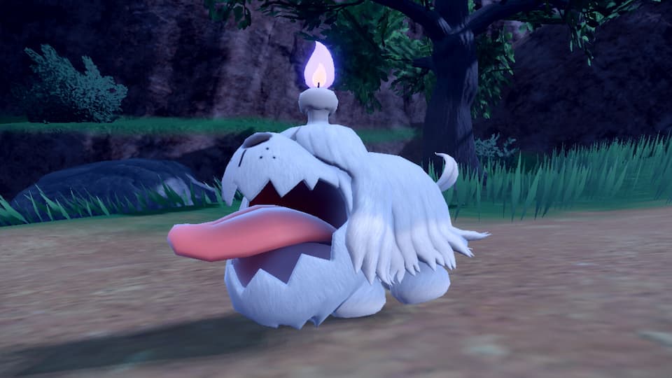 The Pokémon Greavard. It is a white, dog-like Pokémon with a large tongue, with a purple candle on top of its head.