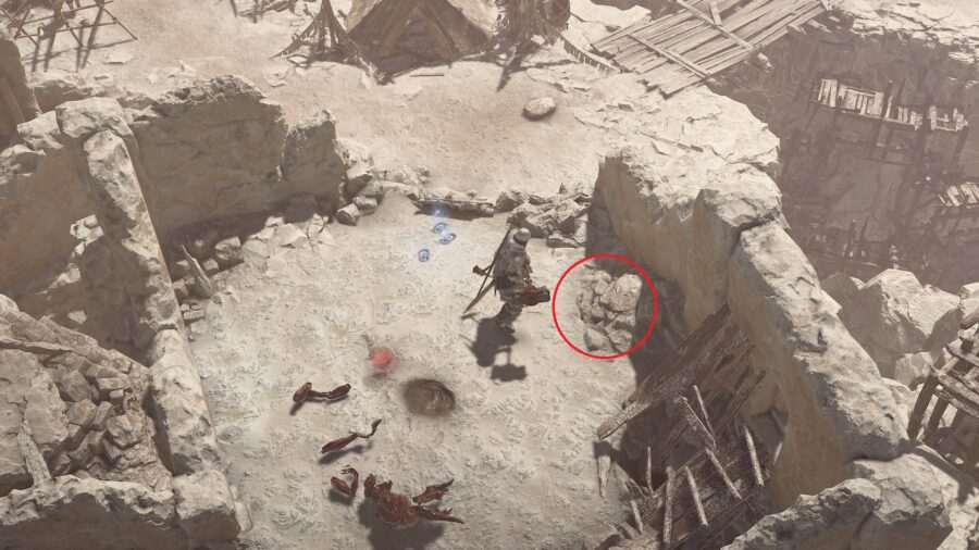 The pile of debris where you can find the Crude Doll for the Blood & Sweat quest.