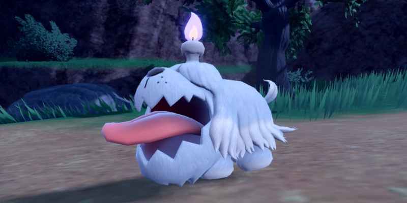 The Pokémon Greavard. It is a white, dog-like Pokémon with a large tongue, with a purple candle on top of its head.