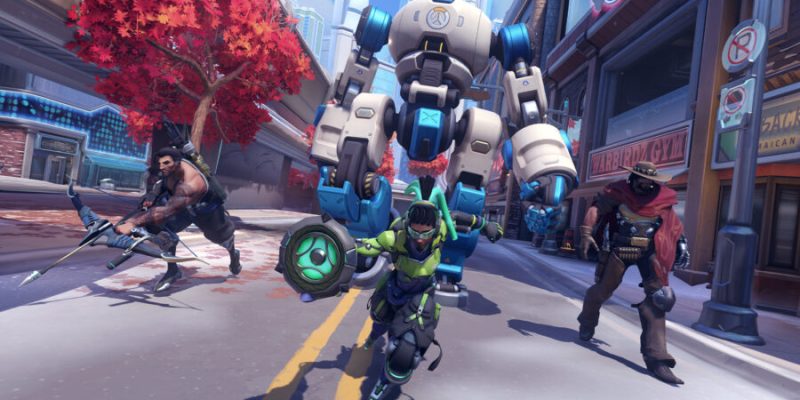 Lucio, Hanzo, and Cassidy alongside Overwatch 2's Push robot.