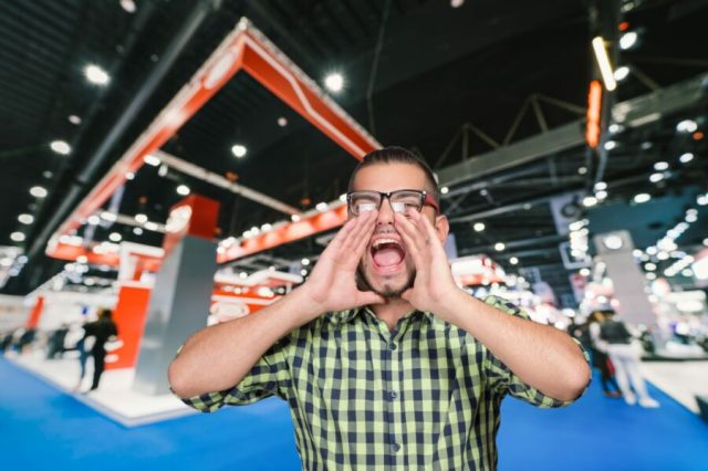 Man Running Through Convention Center Shouting for Lost Child Really Killing It in Heavy Rain Cosplay