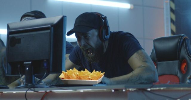 “Gotta Keep My Fingers Clean,” Says Gamer Eating Face First out of Dorito Trough