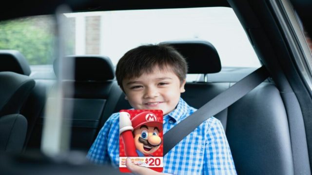 Kid Excitedly Reads Back of Nintendo eShop Gift Card During Drive Home From GameStop