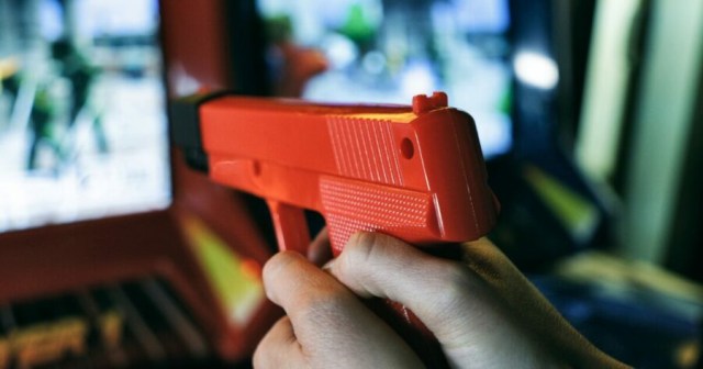 Three Unarmed Civilians Shot After Cop Plays Area 51 Arcade Game